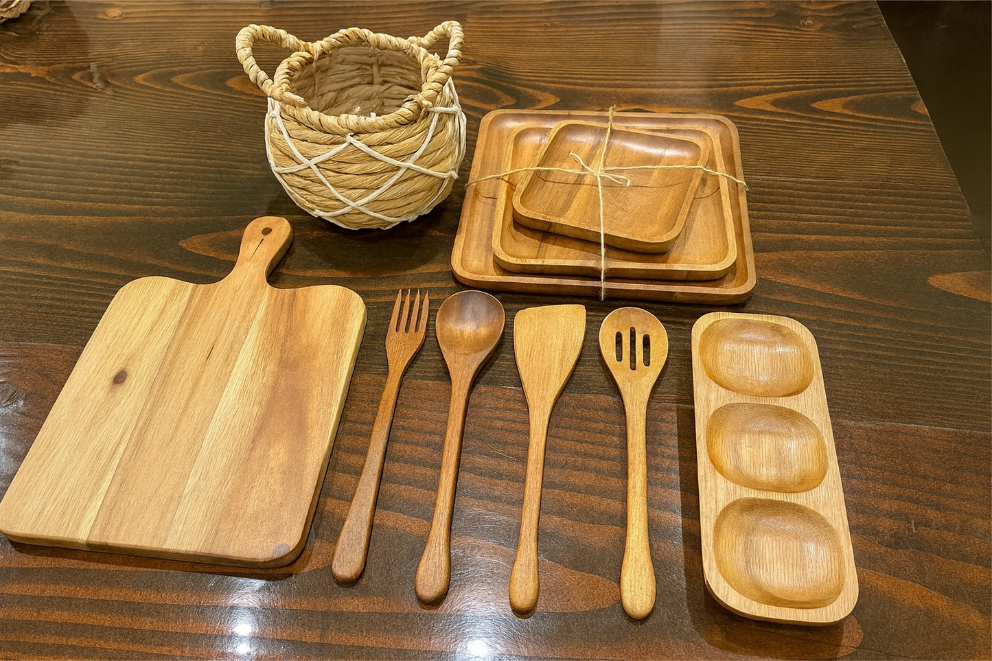 Eden Grace Acacia Wood Kitchen Gift Basket, 11-Piece – Wicker Storage Basket with Mini Planter, 3 Wooden Serving Trays, Cutting Board, 5 Utensils & 3-Section Tray